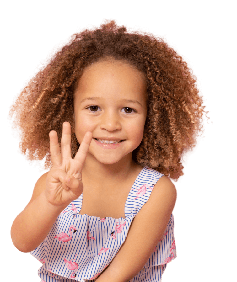 A child holding up their three fingers