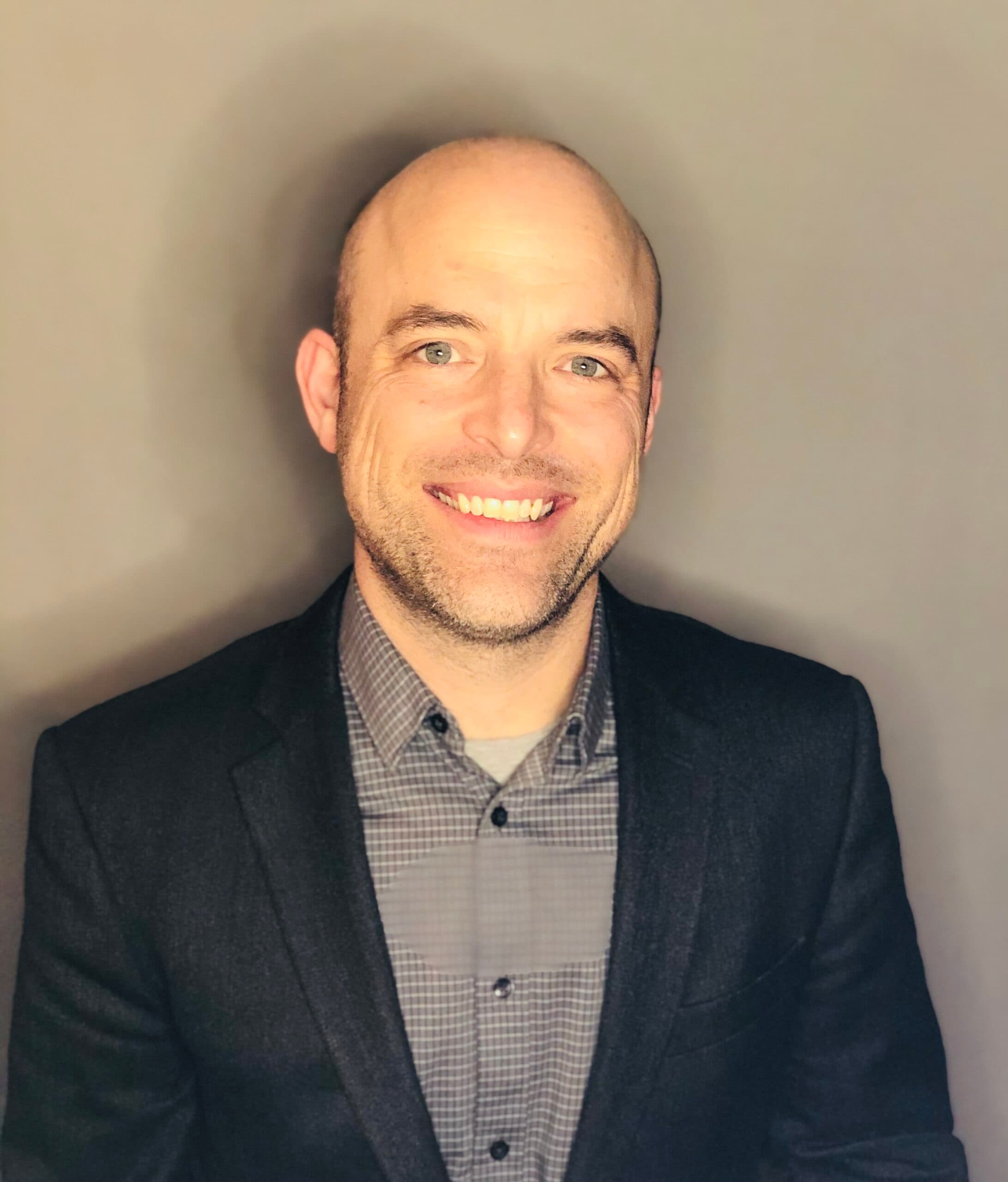 Headshot of First Steps for Kids Director of Research Jonathan Tarbox