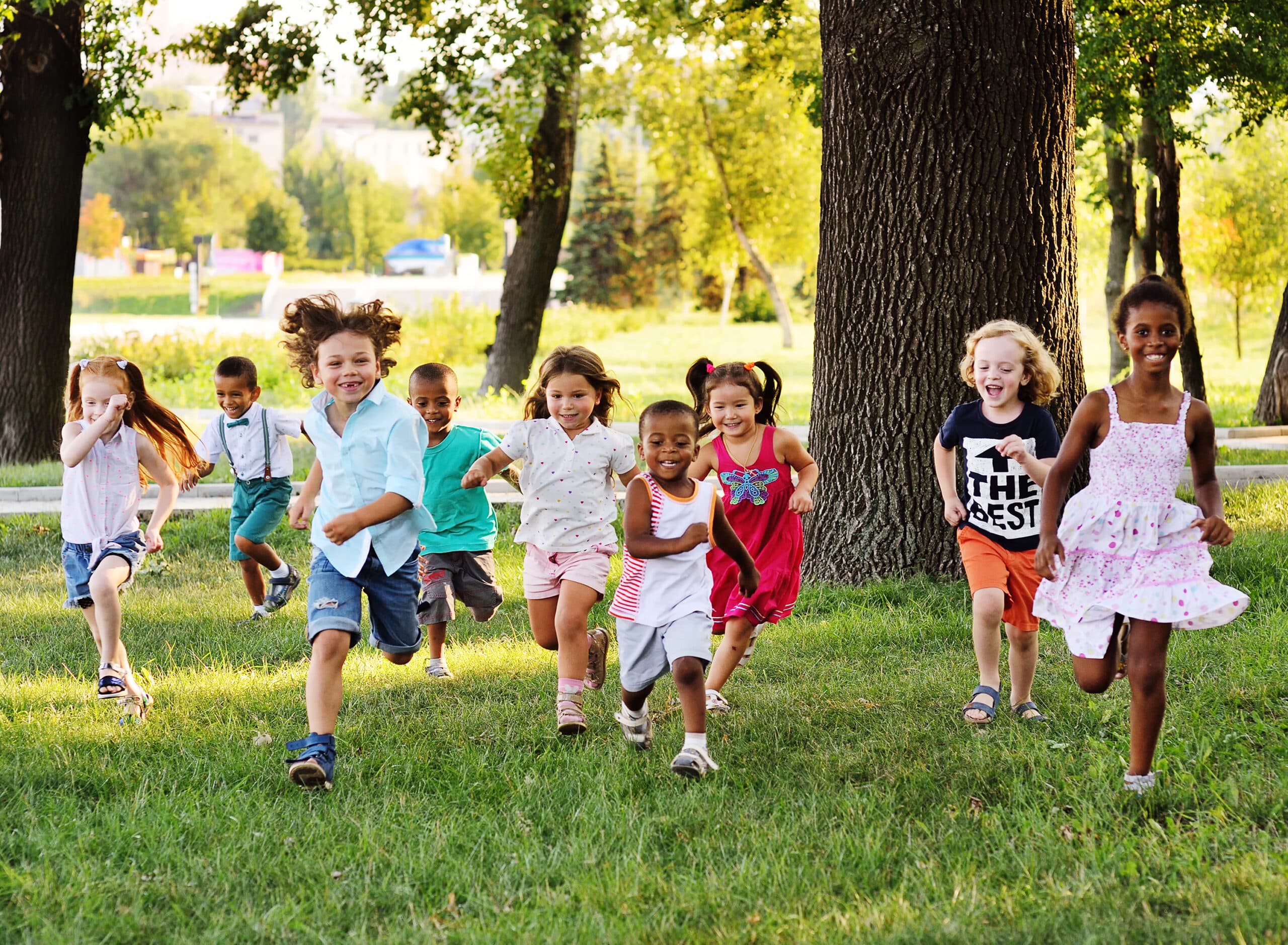 Toddlers running in a field